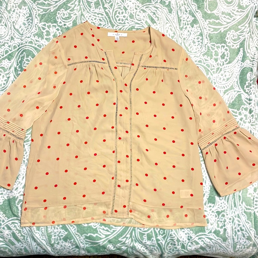 Cream with red dots. Women’s shirt